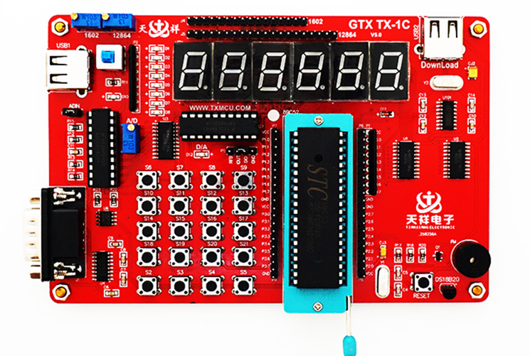 一张型号为GTX TX-1C的C51开发板，配有数码管、STC单片机及多种接口