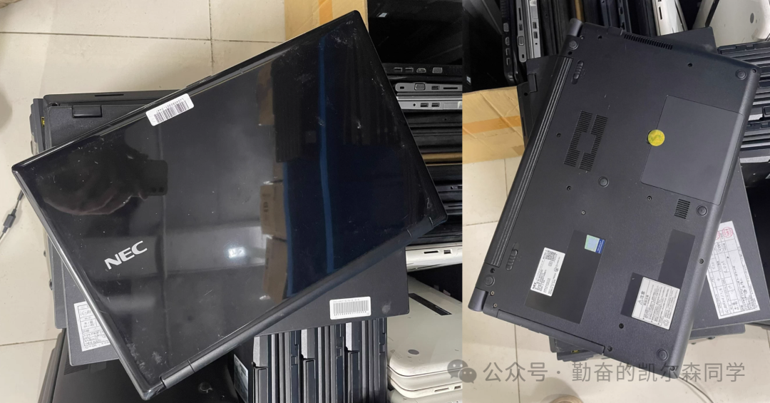 堆叠的NEC笔记本电脑