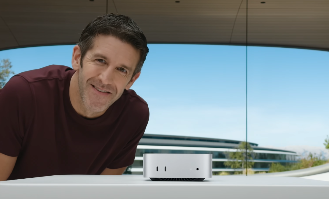 库克与Mac mini合影