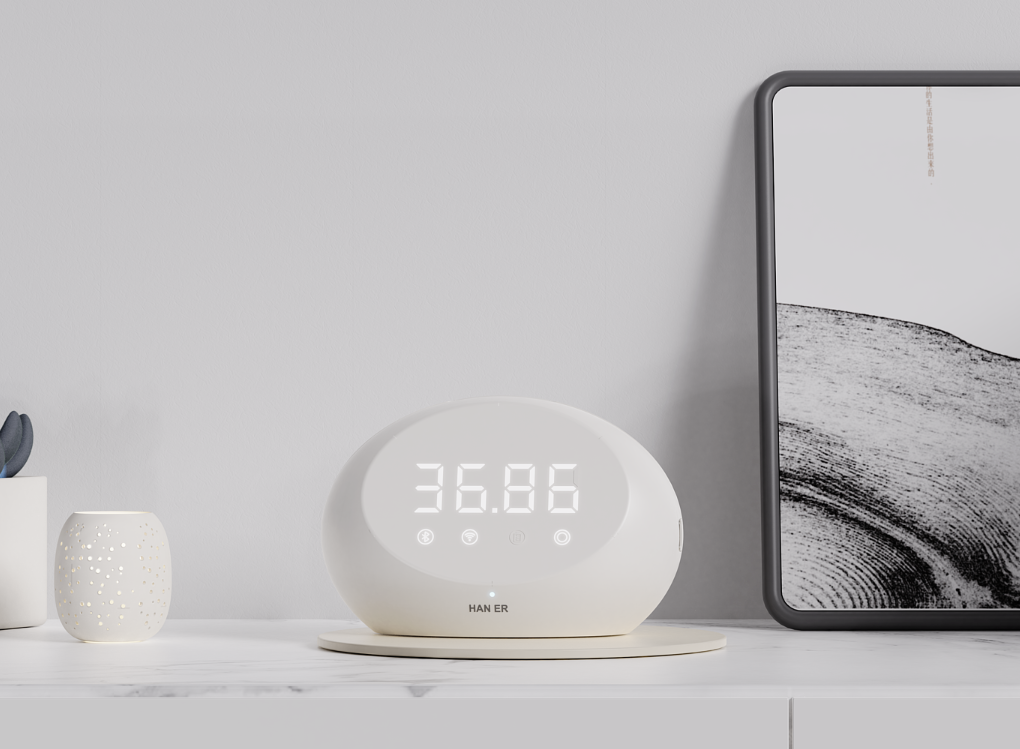 白色椭圆形智能设备显示数字36.86，置于浅色背景中