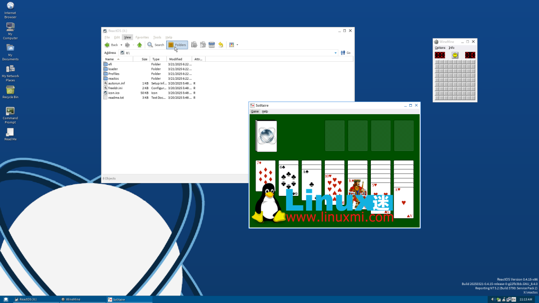 ReactOS桌面运行截图，包含文件浏览器和纸牌游戏