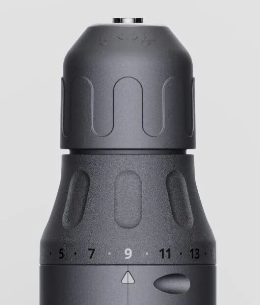 黑色电钻夹头与扭矩调节环特写，展现工业纹理