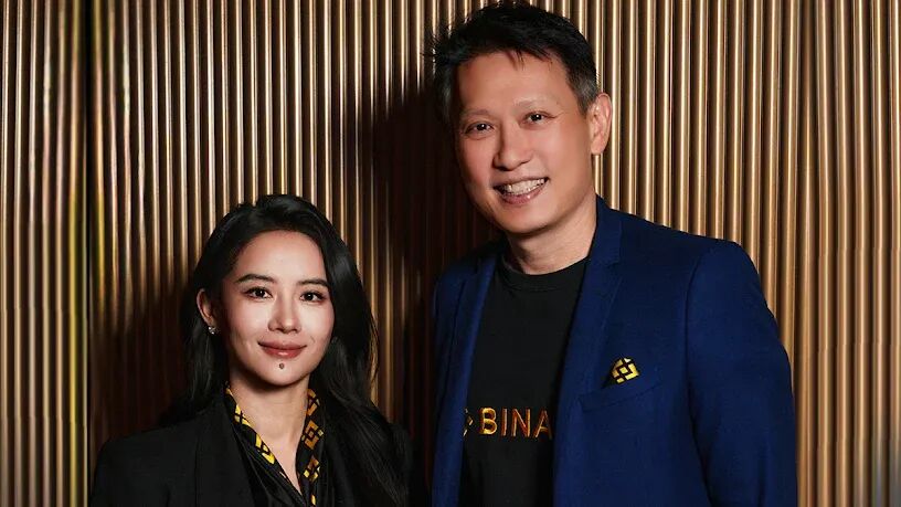 币安高管何一与Richard Teng合影