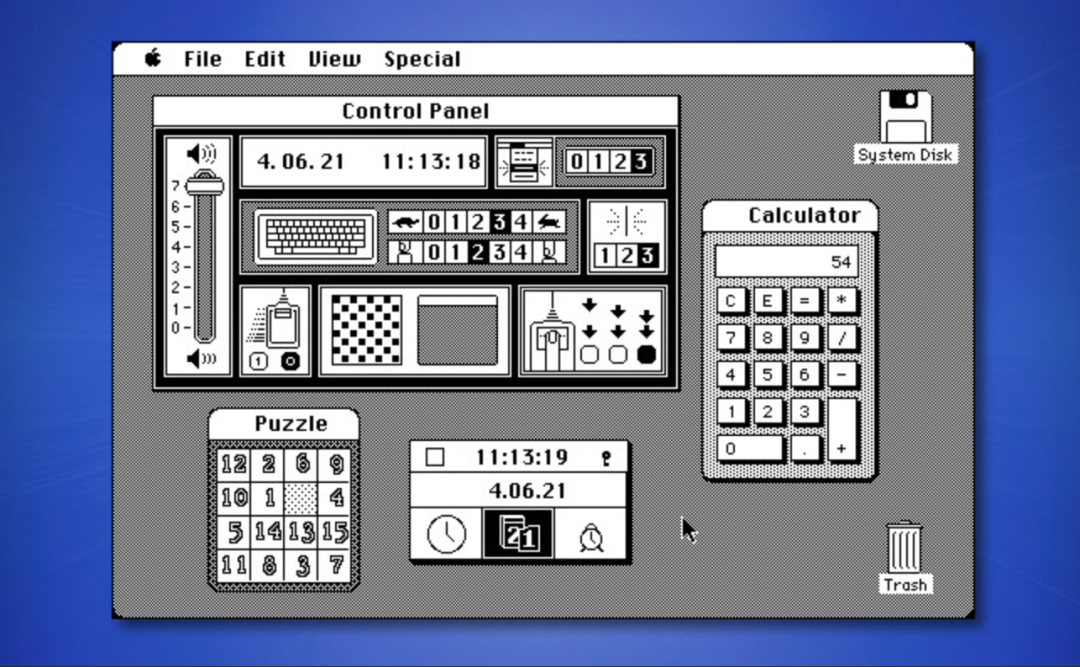 Macintosh系统桌面,包含控制面板与计算器