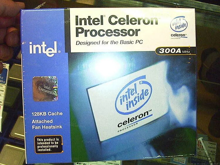Intel Celeron 300A MHz 处理器包装盒实物，蓝白配色，标注128KB Cache