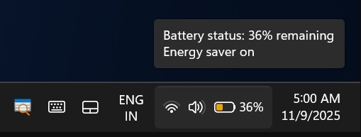 Windows 11任务栏截图：节能模式橙色电池图标