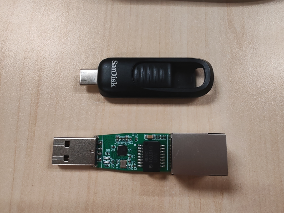 CH397网卡与拆解后的U盘内部结构