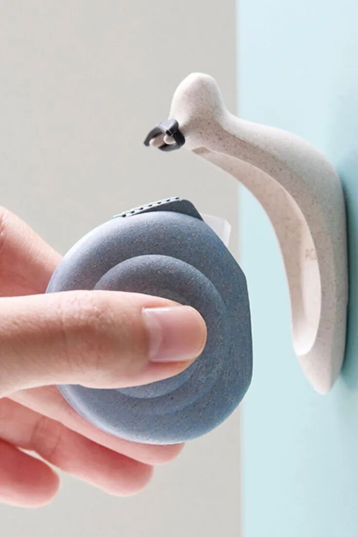 鸟形挂钩悬挂圆形物体