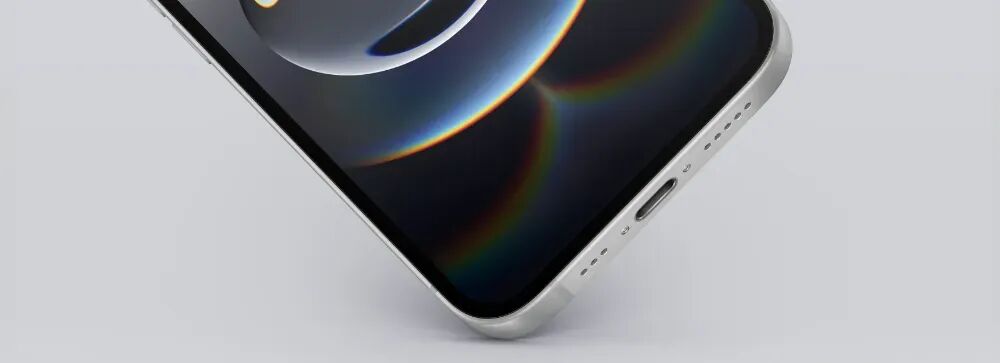 展示iPhone侧面USB-C接口和扬声器开孔的特写图