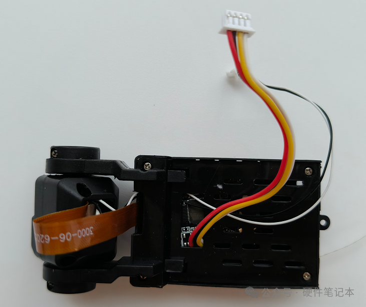 拆下的摄像头与光流传感器模块