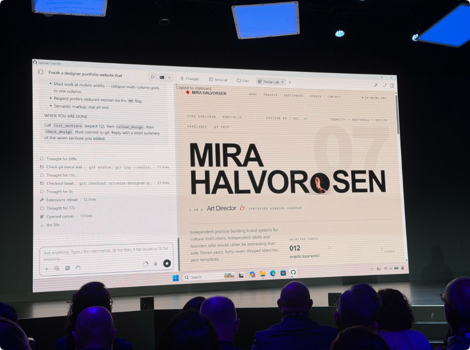 AMD 发布会现场屏幕展示 GitHub Copilot 对话框与 MIRA HALVORSEN 作品集网页