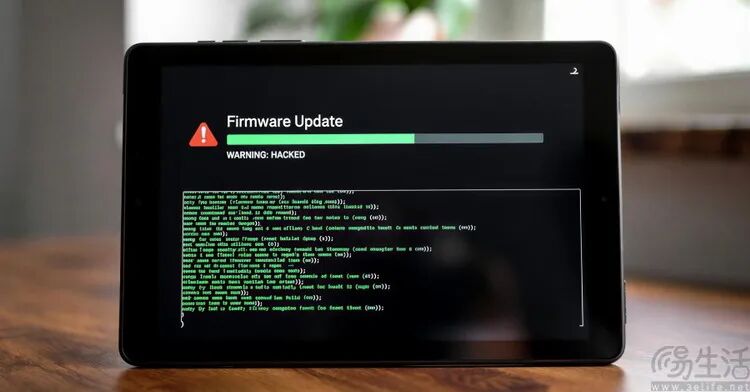 伪造的固件更新界面，显示“WARNING: HACKED”警告
