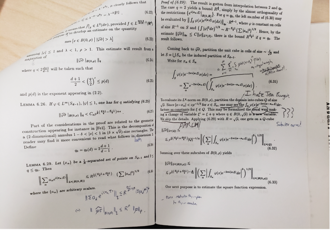 一张充满手写批注的数学论文页面特写