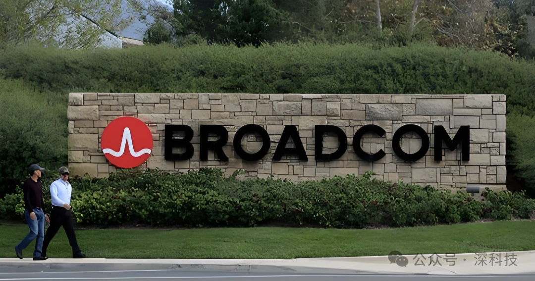 位于石墙和绿植前的Broadcom公司红色logo