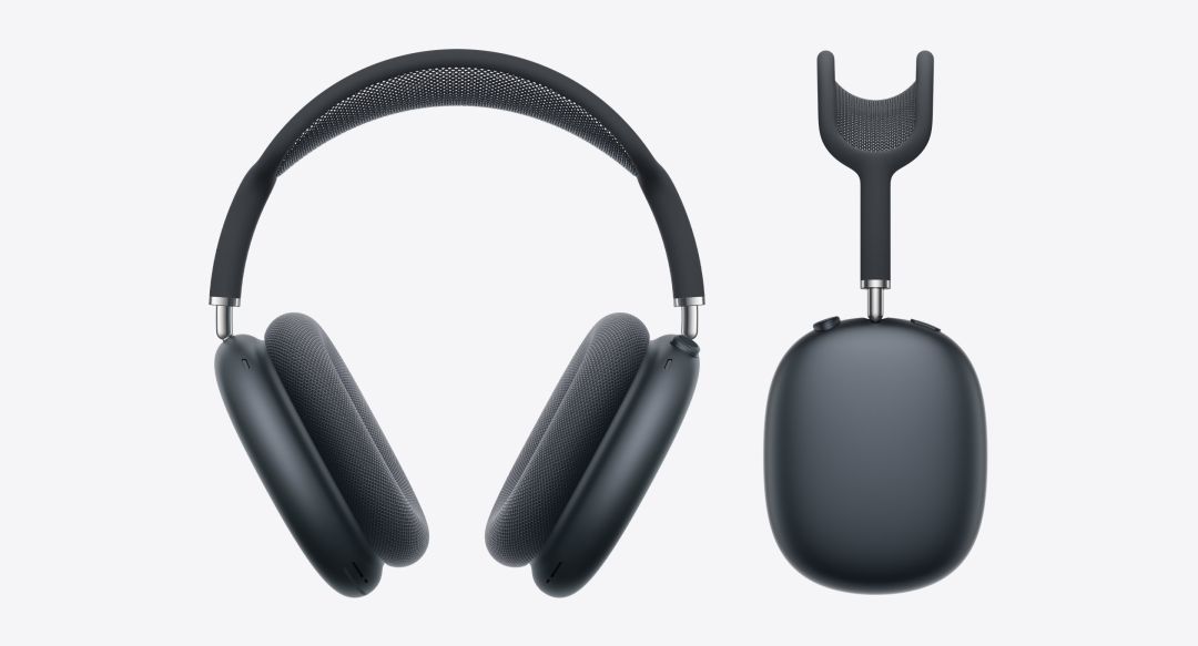 黑色的头戴式无线耳机及其充电盒