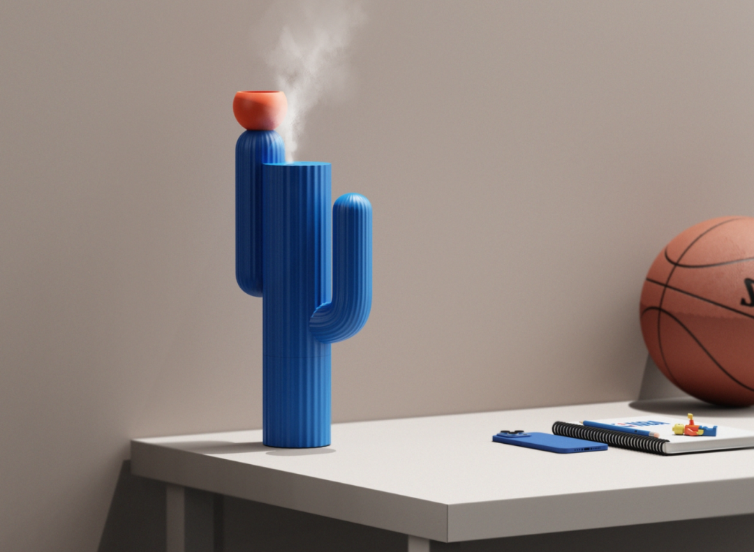 蓝色Cabu加湿器与手机、笔记本等静物