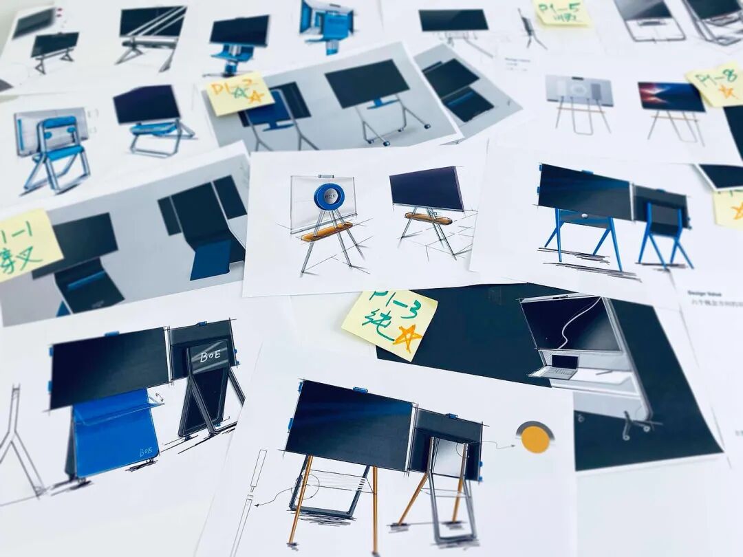 显示器支架设计草图散落桌面