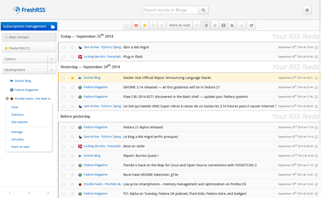 FreshRSS 经典界面截图:左侧订阅分类栏显示 Main stream、Favourites、Docker Blog 等源,右侧文章列表按 Today 与 Yesterday 日期分组展示,顶部提供搜索和 Mark as read 操作