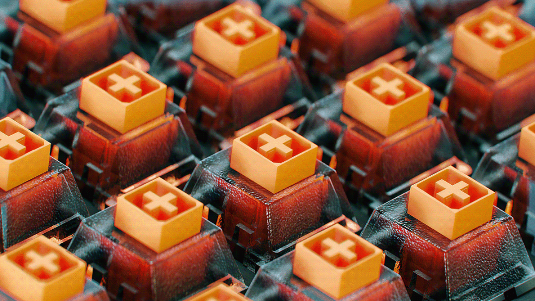 橙黄色十字图案机械轴体特写