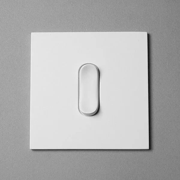 白色方形面板中央的椭圆形凹陷按钮