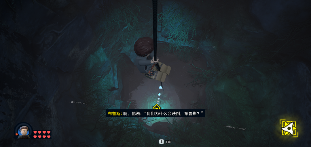 布鲁斯在洞穴环境中悬挂于绳索上的游戏画面