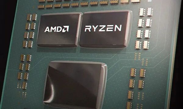AMD Ryzen处理器特写:黑色芯片印有白色AMD和RYZEN标志,周围排布密集的金色焊点和电路走线