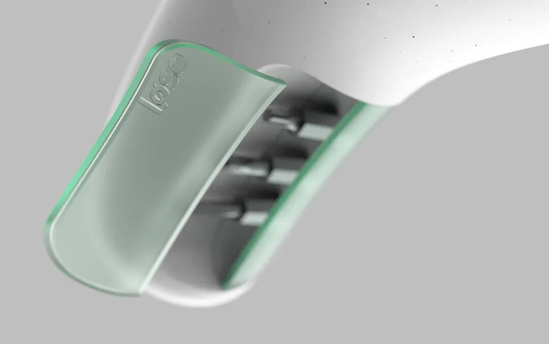 一张产品特写图，展示了一个白色设备的局部