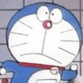 哆啦A梦惊讶表情，蓝色身体，嘴巴微张