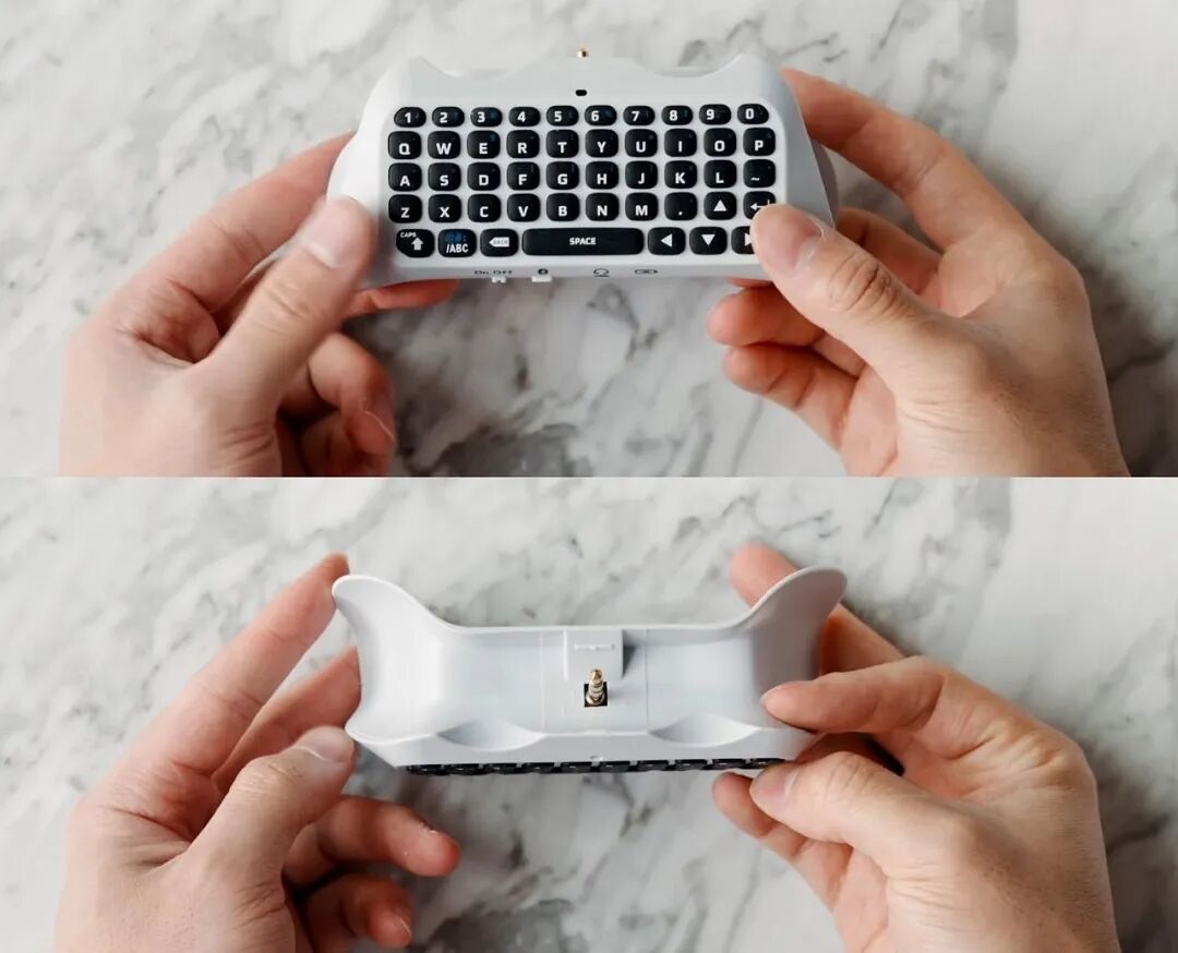 正反面视角白色便携式游戏手柄键盘