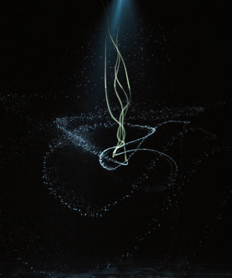 黑色背景中向上延伸的发光绿色曲线与螺旋光点