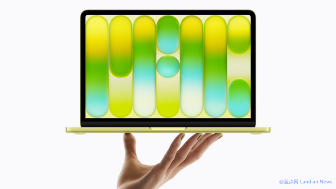 金色MacBook Neo运行抽象图形界面